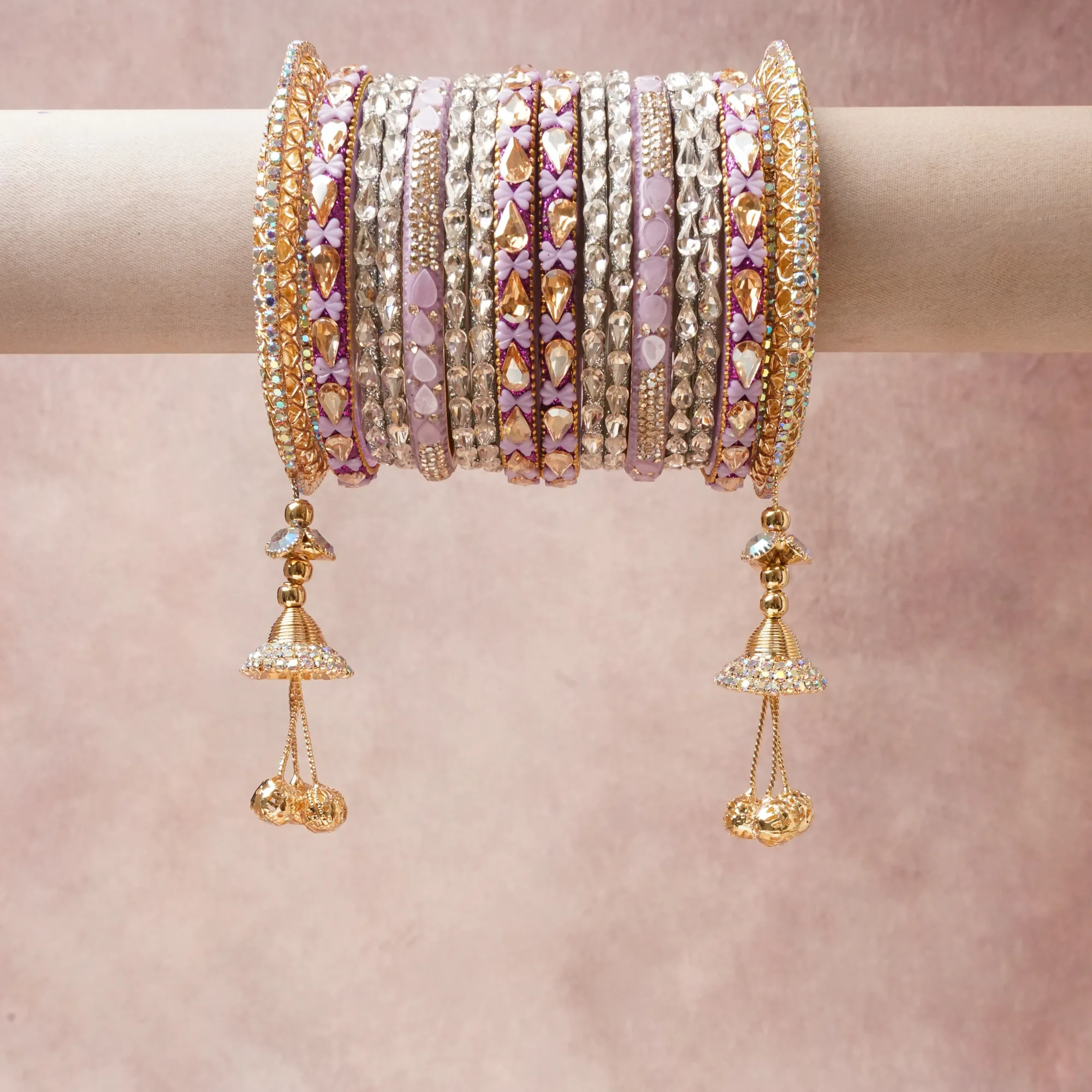 A commanding Lavender anchors this beautiful set, enriched with accents of Clear Faceted, Golden Topaz Faceted, Sparkling Clear Rhinestone that add depth and dimension.

Featuring a striking composition of Gold-toned Metal Alloy, Cubic Zirconia (Clear), Cubic Zirconia (Golden Topaz), Enamel (Lavender), Enamel (Deep Amethyst), Rhinestones (Clear), this set carries intricate craftsmanship and strong presence. Grand in form, it is created for moments that deserve to be marked.